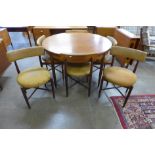 A G-Plan Fresco teak circular extending dining table and six chairs