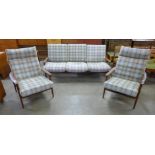 A Guy Rogers teak New Yorker settee and pair of armchairs, designed by George Fejer and Eric