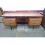 A G-Plan Fresco teak floating top desk