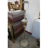 An early 20th Century French brass floor standing lamp