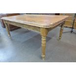 A Victorian style waxed pine farmhouse kitchen table