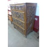 An eastern carved camphorwood secretaire chest of drawers