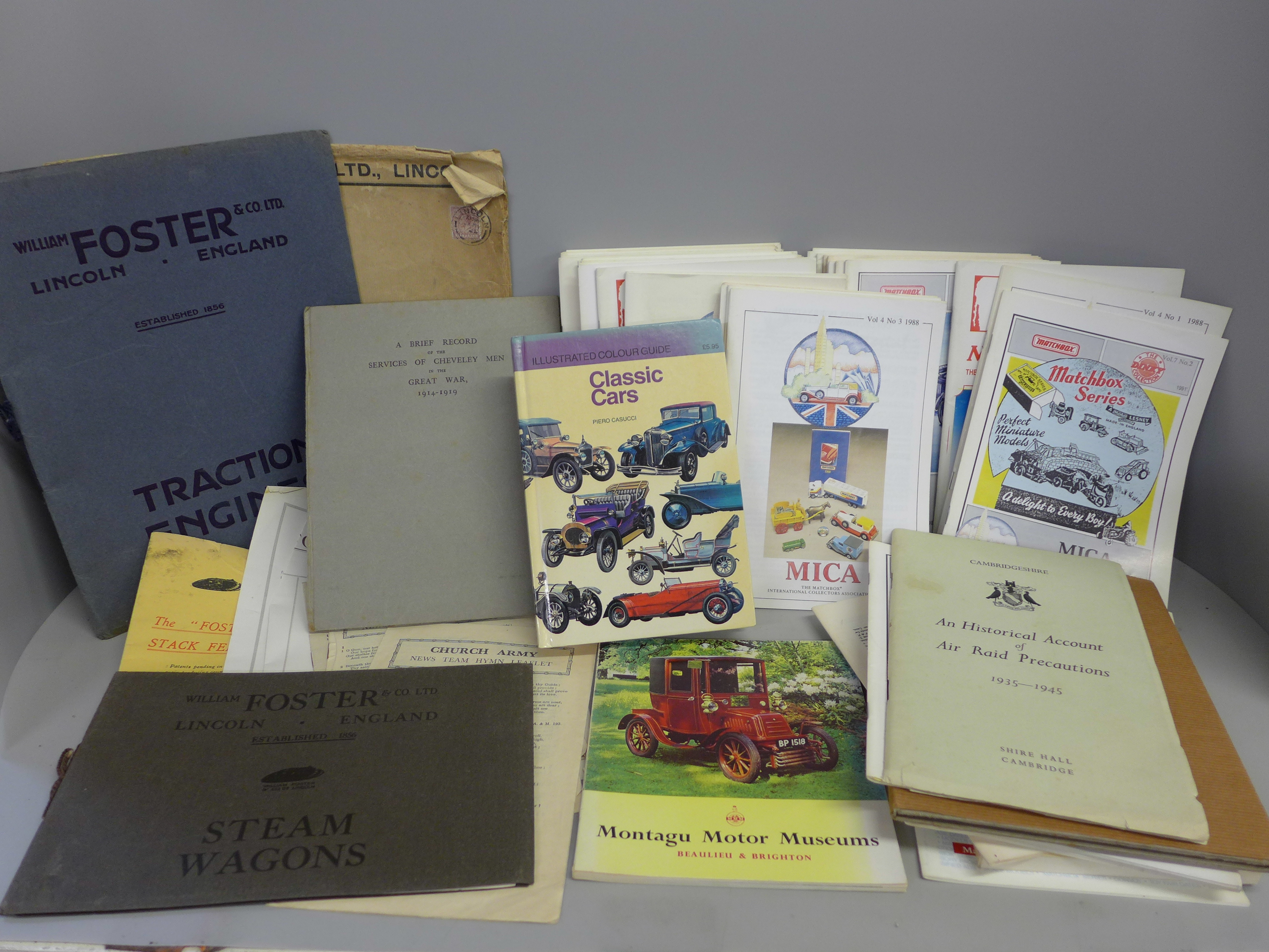 A Tri-ang book, Classic Cars book, a collection of Matchbox booklets, a Brief Record of the Services