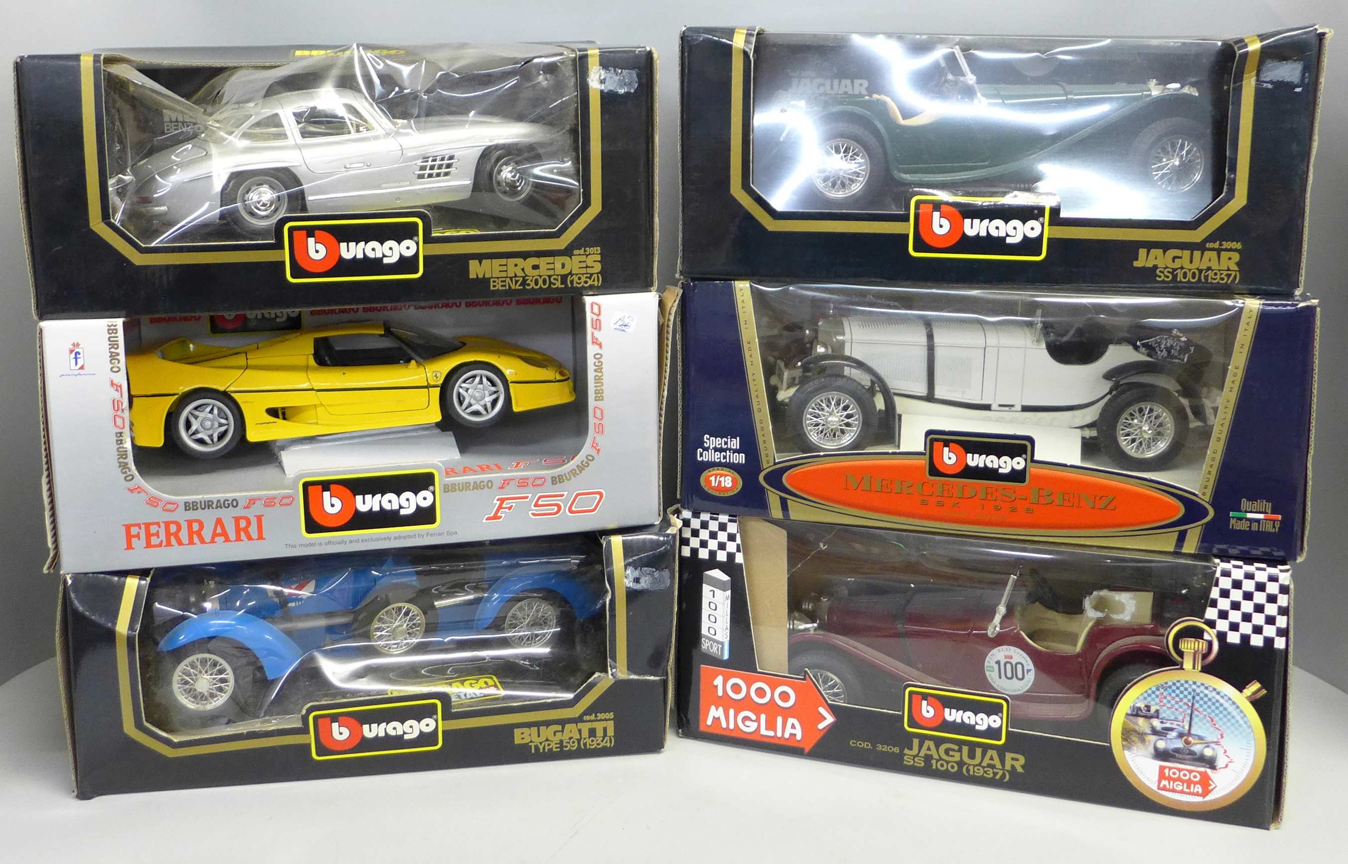 Six Burago model vehicles