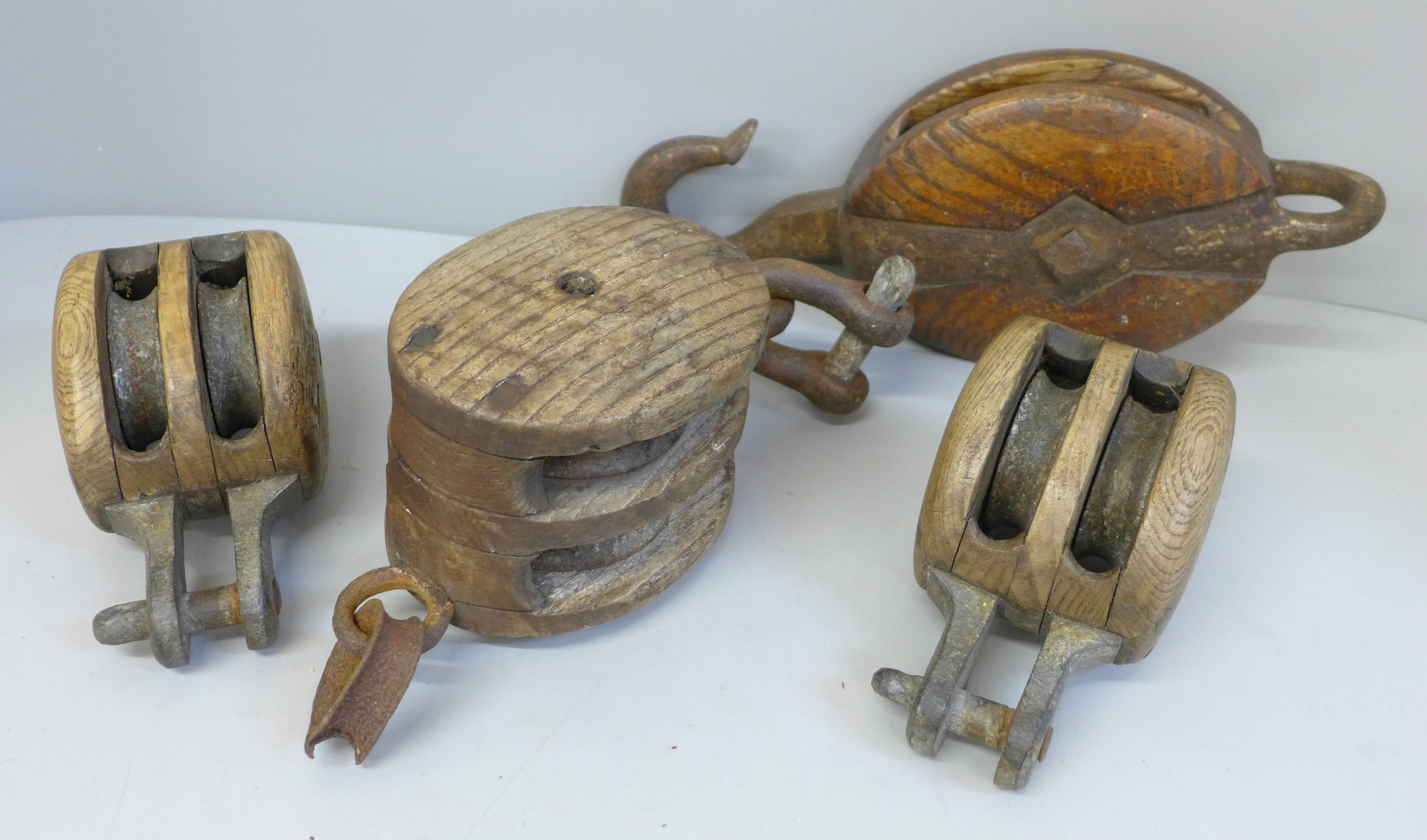Four pulley wheels including a pair