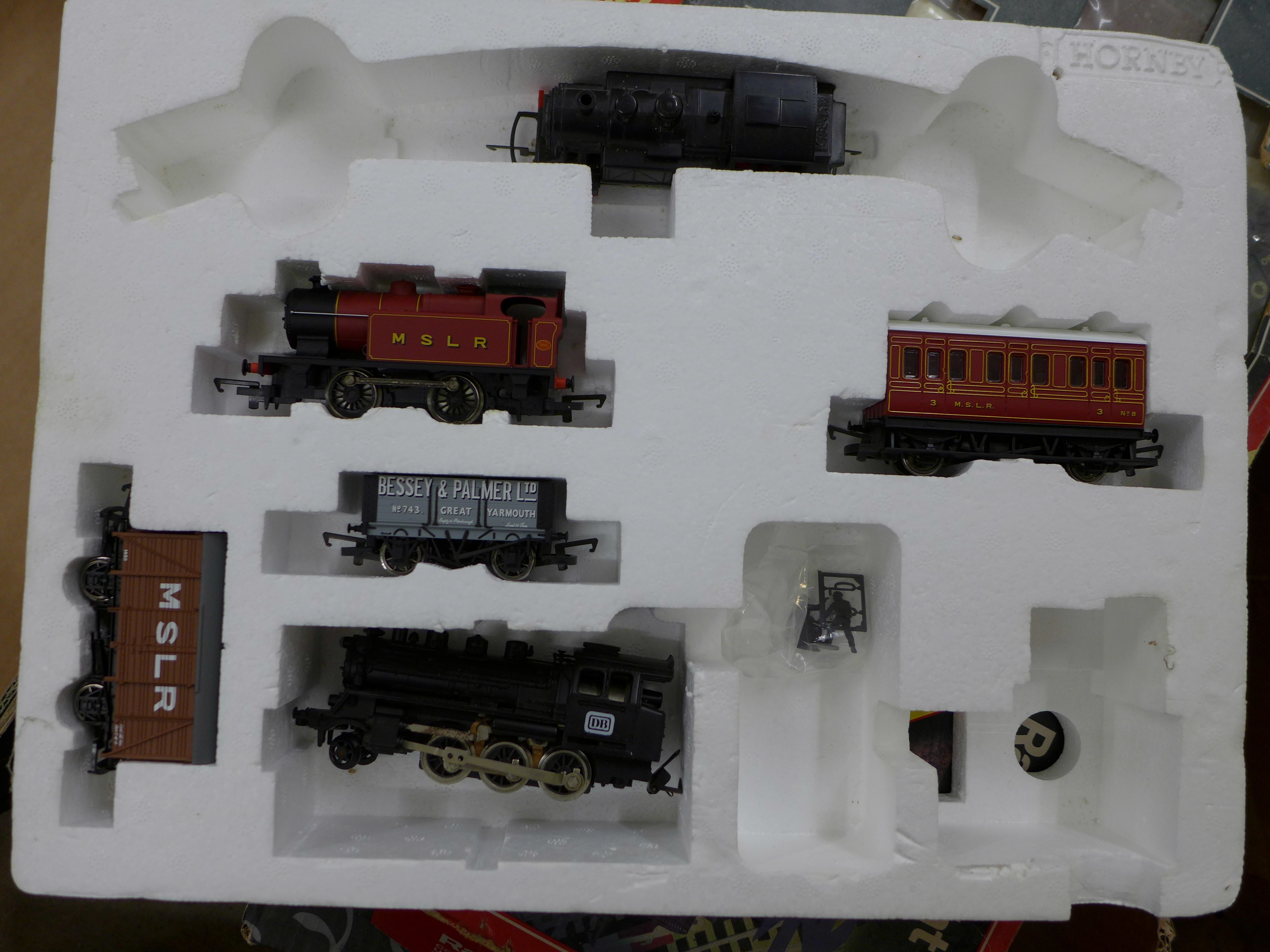 A Hornby The Rover train set, one other part train set, a box of model rail and a box of die-cast - Image 4 of 4
