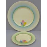 A Clarice Cliff plate and saucer, plate 22.5cm