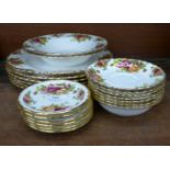A collection of Royal Albert Old Country Roses including six dinner plates, five small bowls, two