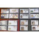 Four albums of first day covers