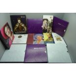 Twelve £5 coin packs including Horatio Nelson, Queen Elizabeth I, The Queen Mother, Diamond Wedding,