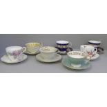 Seven cups and saucers including four Aynsley