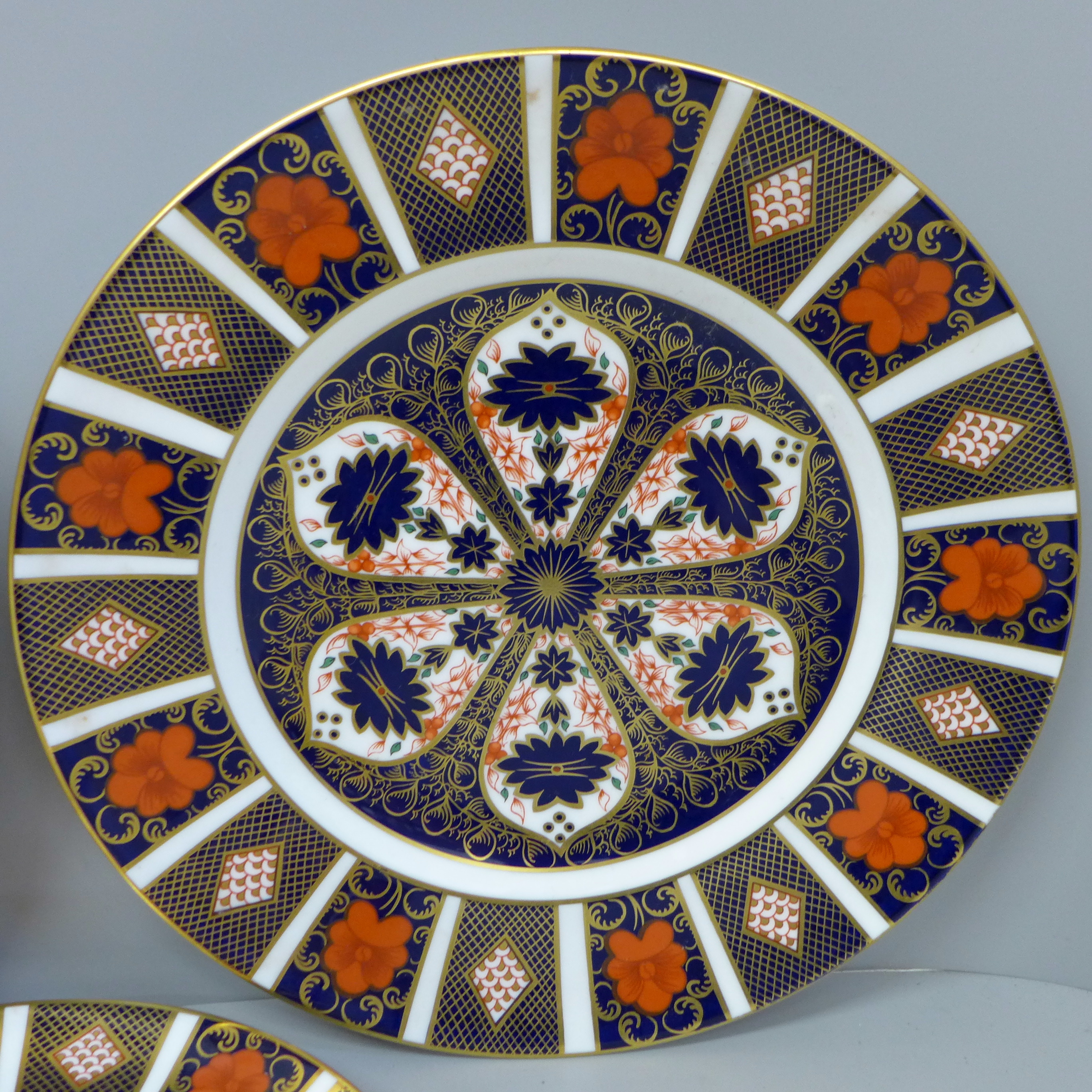 A pair of Royal Crown Derby Old Imari pattern plates and a medium side plate - Image 2 of 2