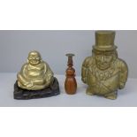 A brass Transvaal money box, a brass Buddha and a wooden handled seal