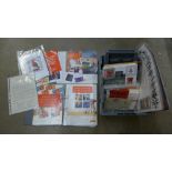 Stamps; Royal Mail items including booklet stand, promotional material, etc., in a plastic Royal