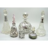 A collection of silver and white metal mounted scent bottles, (6)
