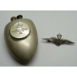 A silver RAF brooch and a trench art lighter made out of two spoons