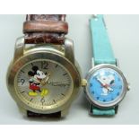 A Disney Mickey Mouse watch and a Snoopy watch