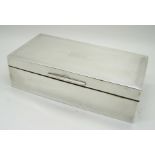 A silver cigarette box, bears initials, Birmingham 1927, 17.5cm