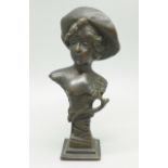 A small French bronze figure of a lady, signed to the back, 10cm