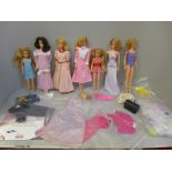 Early Barbie dolls from the 1960s to 1970s with clothes, shoes, etc.
