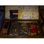 A large collection of Meccano in a wooden chest