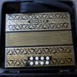 A cased Hohner accordion