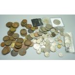 A collection of British and foreign coins including silver and half silver, a bi-centennial half