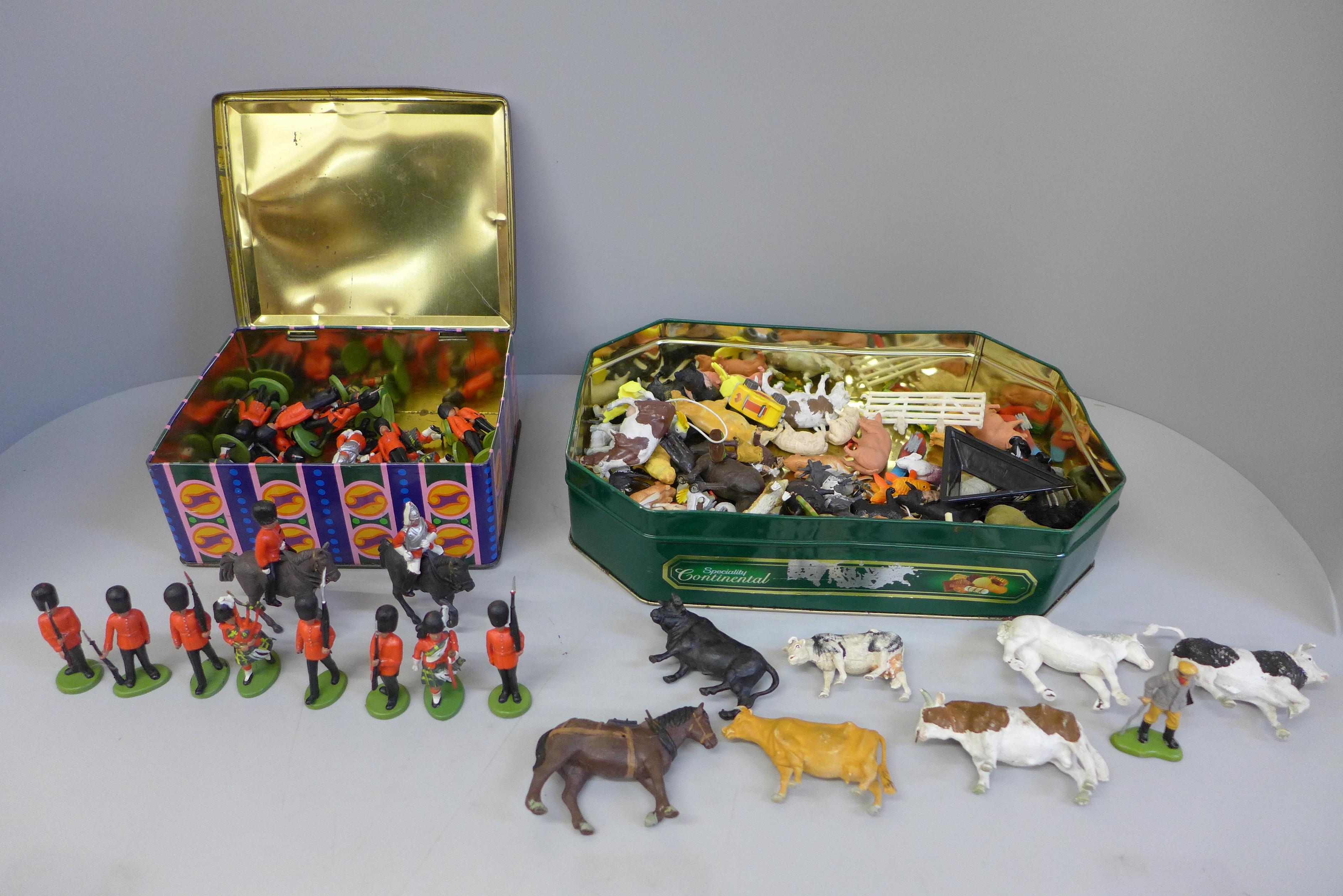 A collection of Army and animal figures, mainly Britains