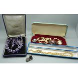 A pair of silver napkin rings, 28g, an amethyst quartz necklace and other jewellery