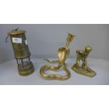 A Ferndale Coal Mining Co. miners lamp, a brass model of a miner and a brass cobra candlestick