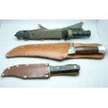 Three hunting knives, one by William Rodgers and one marked Buffalo Hunter