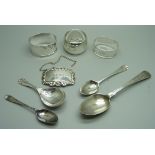 Silver including a Victorian spoon, a caddy spoon and three napkin rings, 135g