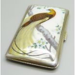 An early 20th Century German silver cigarette case with enamel front, bird of paradise with gold