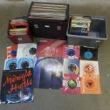 A collection of LP records and 7" singles