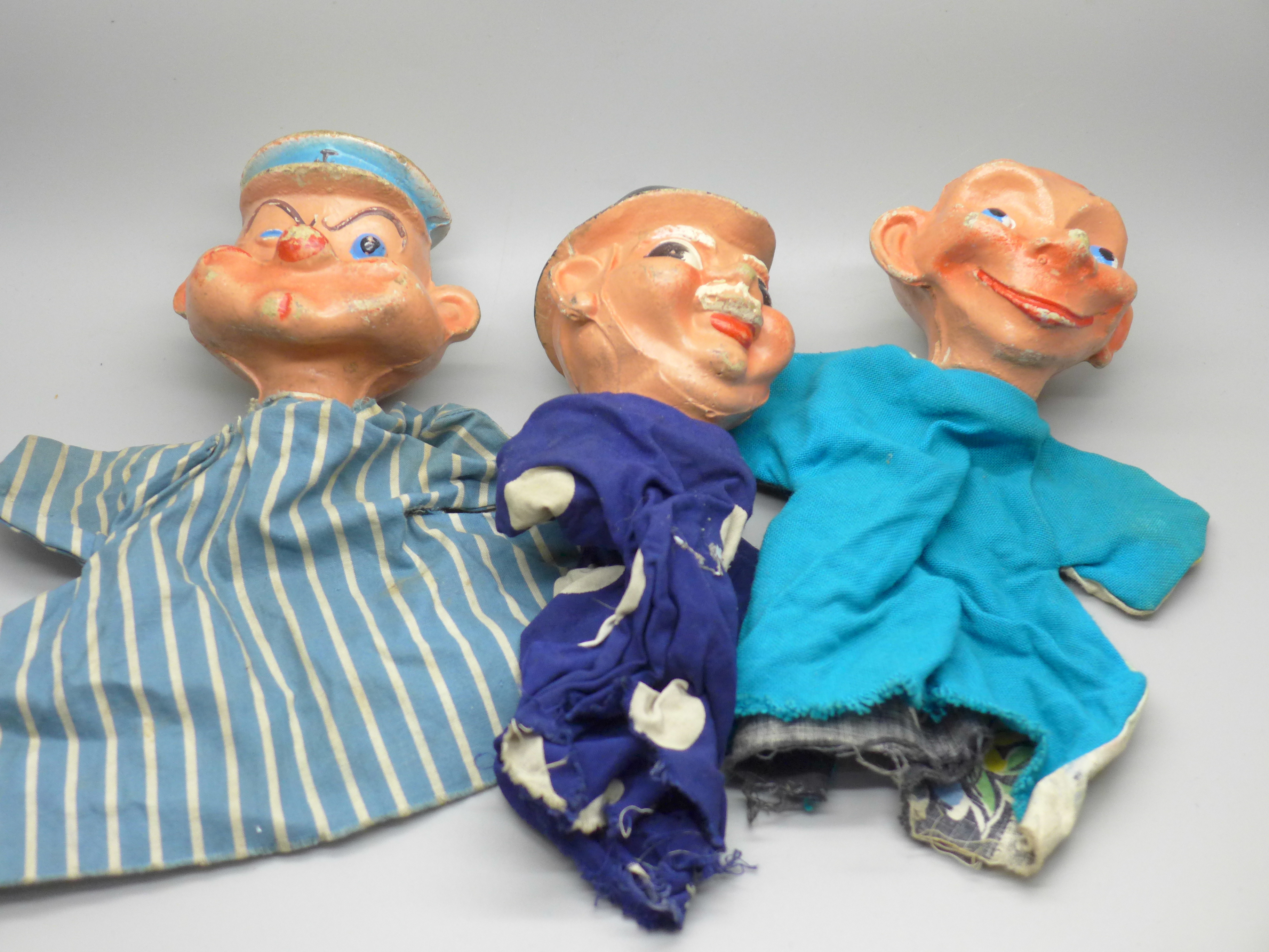 Three glove puppets/dolls including Popeye