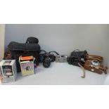 A collection of cameras including Agfa Select, Minolta 7000, Olympus Zoom, Fujifilm 300 and flash