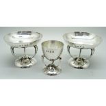 A pair of hammered silver bon-bon dishes and a hammered silver egg cup, George Edward & Sons,