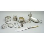 Silver items comprising a small oil lamp, a small enamelled mirror, napkin ring, salt spoons,