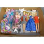 Three Barbie dolls and a Sindy doll, 1970s, with some clothing