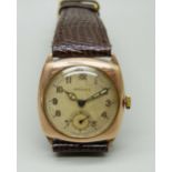 A 9ct gold Rolex wristwatch with a cushion case, the 27mm case hallmarked London 1944