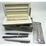 Two Parker ballpoint pens and two Colibri pens