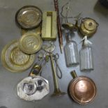 A collection of metalwares including chargers, a bed warming pan, cruet set, etc. **PLEASE NOTE THIS