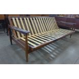 A Guy Rogers teak Manhattan sofa bed, designed by George Fejer and Eric Phamphilon