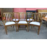 A set of six Meredew teak dining chairs