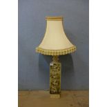 A faux stone based table lamp