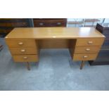 An Austin Suite teak desk