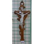 A French carved wood and faux ivory crucifix