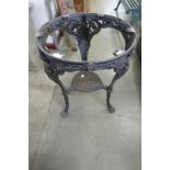 A cast iron pub table base