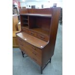 A Danish teak secretary chest of drawers