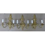A set of three 19th Century style French gilt metal wall mounted lights